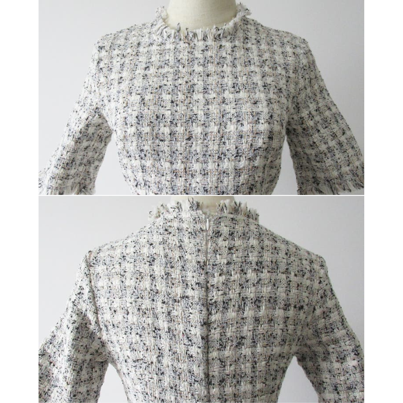 上半身のツイード生地をクローズアップし、肌触りや仕上がりの丁寧さを示す