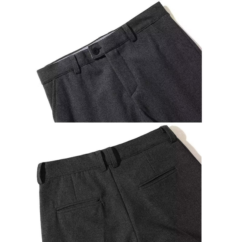 ブラックのテーパードパンツのディテールを見せた画像