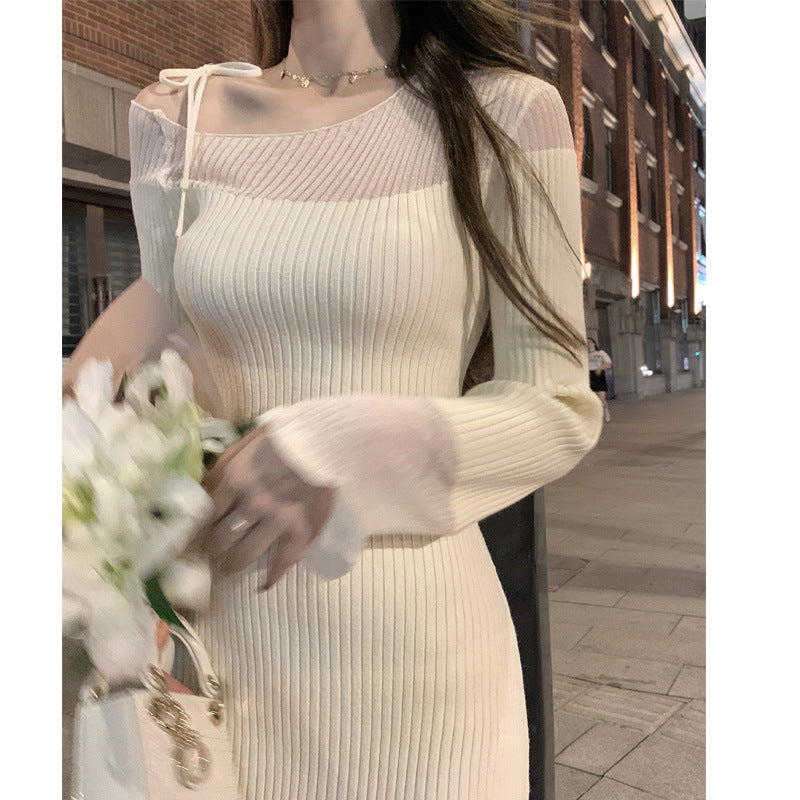 ふんわり広がる袖のデザインがフェミニンなワンピース(ホワイト・ディテール)