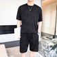 シックな黒セットアップで夏の都会スタイルに