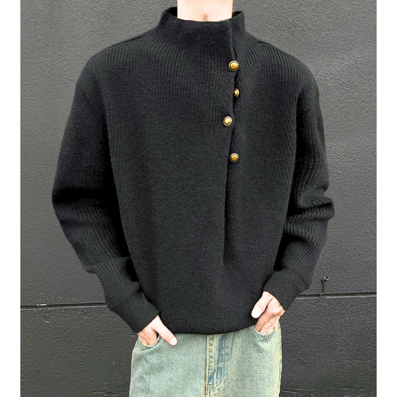 ブラックニットを着た男性の上半身コーデ写真