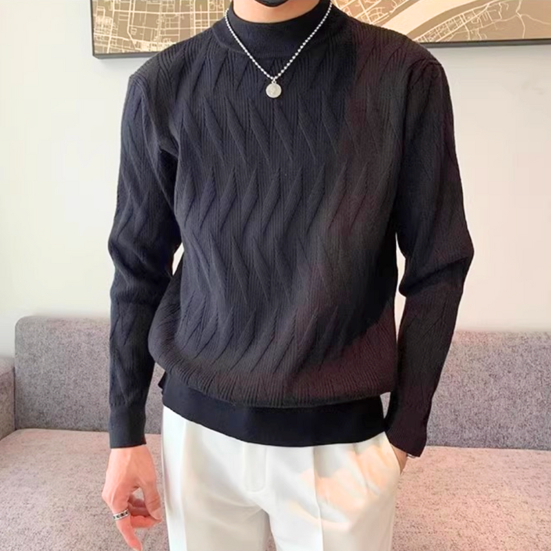ブラックの波打ちリブが印象的。40代メンズの落ち着きあるスタイルに