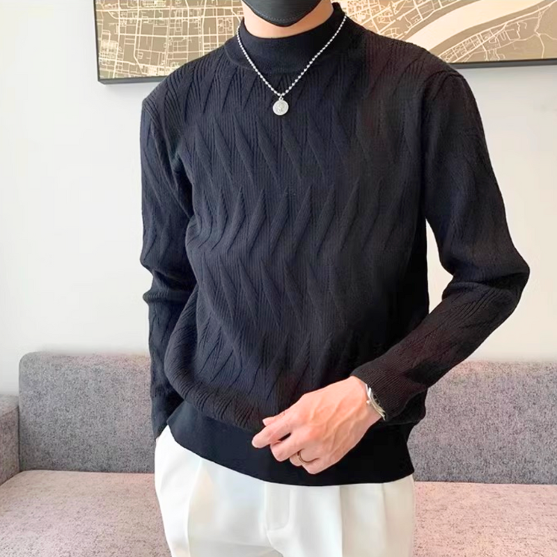 ブラックのニットと白パンツの組み合わせでスタイリッシュにまとめたカジュアルコーデ