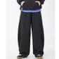 スタイリッシュなブラックワイドパンツで落ち着きある大人の着こなしに