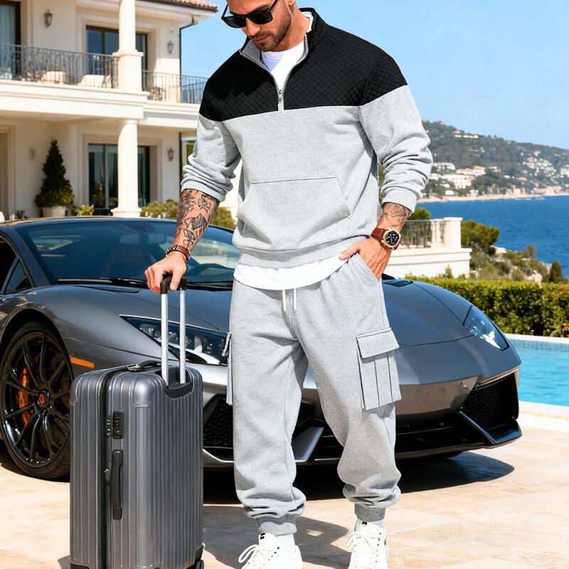 グレー×ブラックの配色スウェットのサイドスタイル｜脚長効果のあるカーゴパンツ仕様