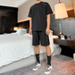 ブラックの肩ジップ半袖セットアップ着用正面